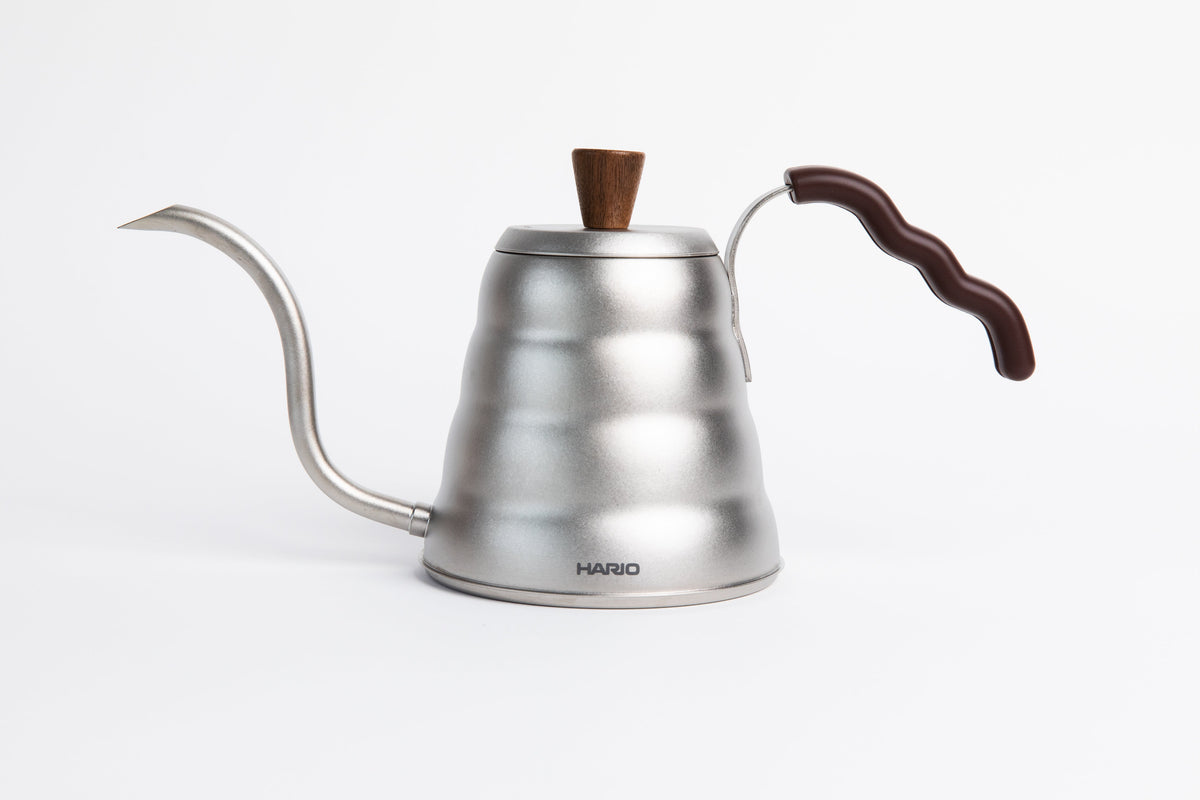 Beehive shape pour over kettle with wooden knob and handle on a white background