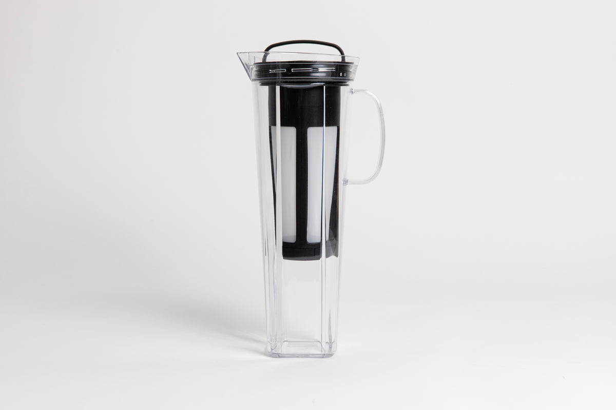Tall plastic clear server with black nylon mesh coffee filter insert and black plastic handle and lid. set on a white background