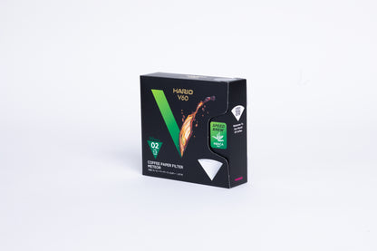 Black Hario V60 coffee paper filter packaging on a white background