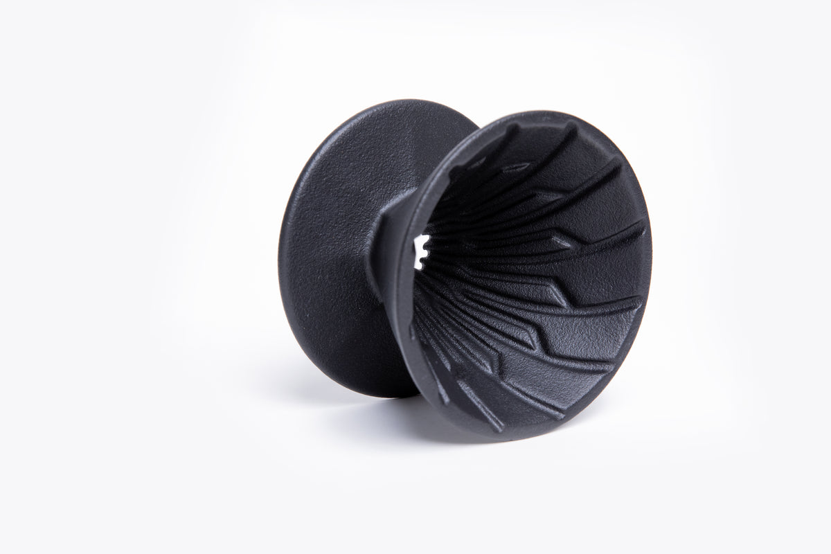 matte black dripper cone with interior ribbing on a black background