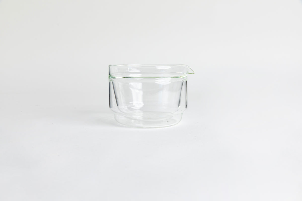 Double-walled glass cup. set on a white background